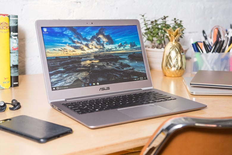 Asus ZenBook UX330UA laptop on a desk.